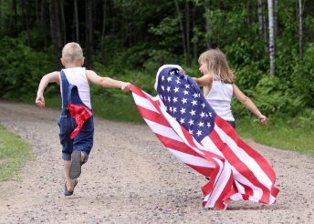 kids running with flag