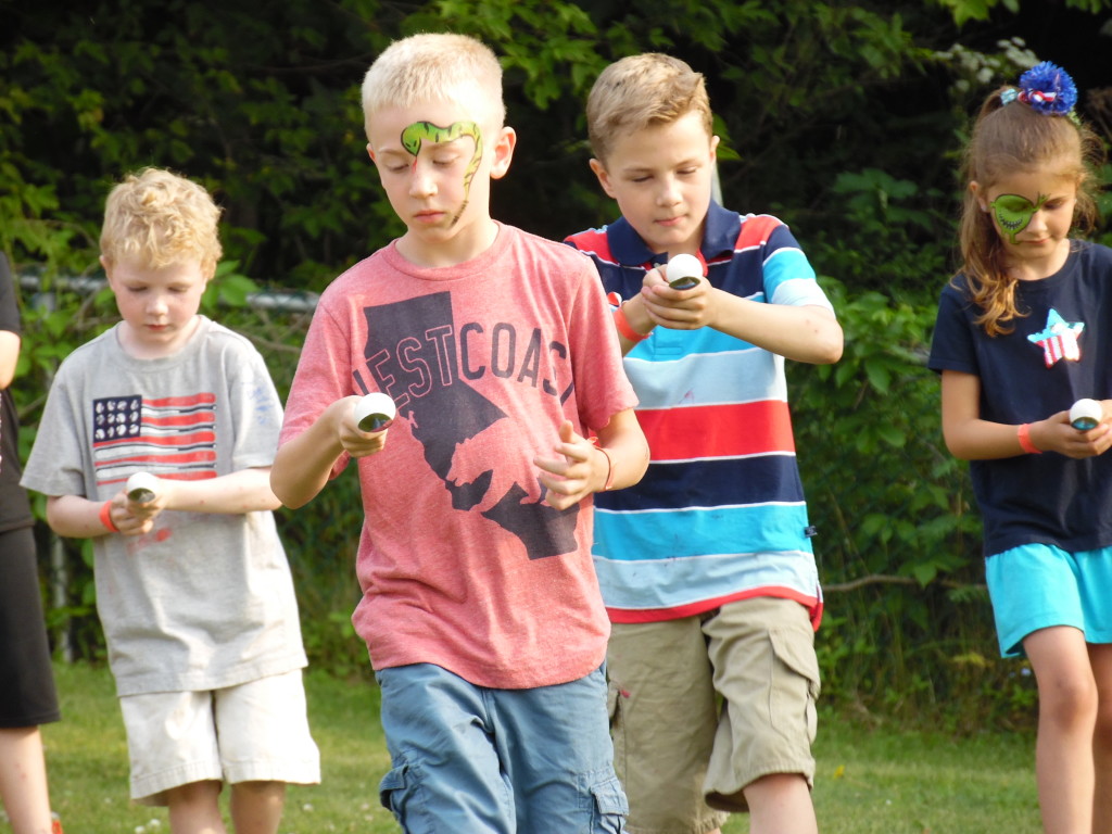 kidsgamesphelpsjuly4theggspoonrace Phelps Chamber of Commerce